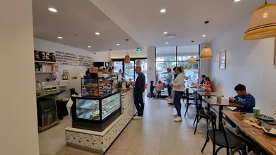 Coffee shop Steaming Mug in Alfords Point